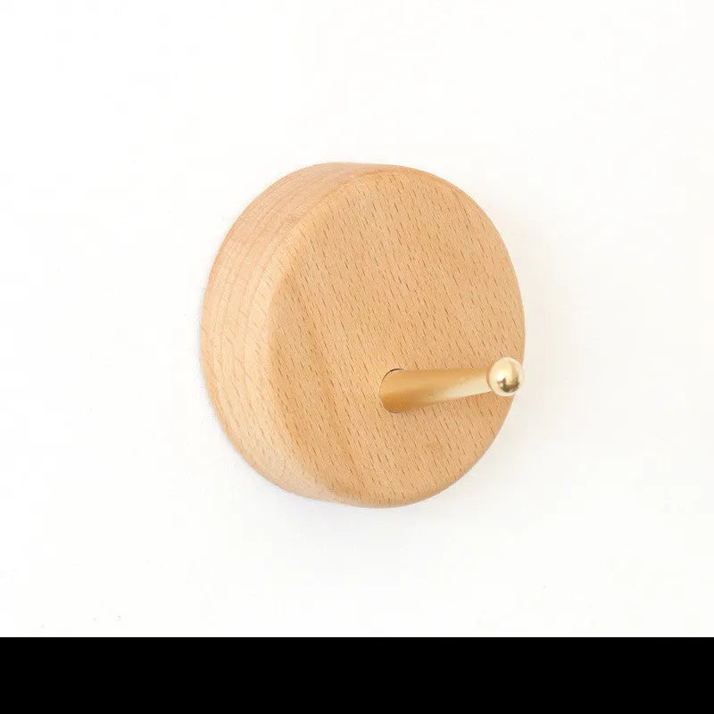 Natural beech wood adhesive wall hook with brass fitting in five minimalist shapes
