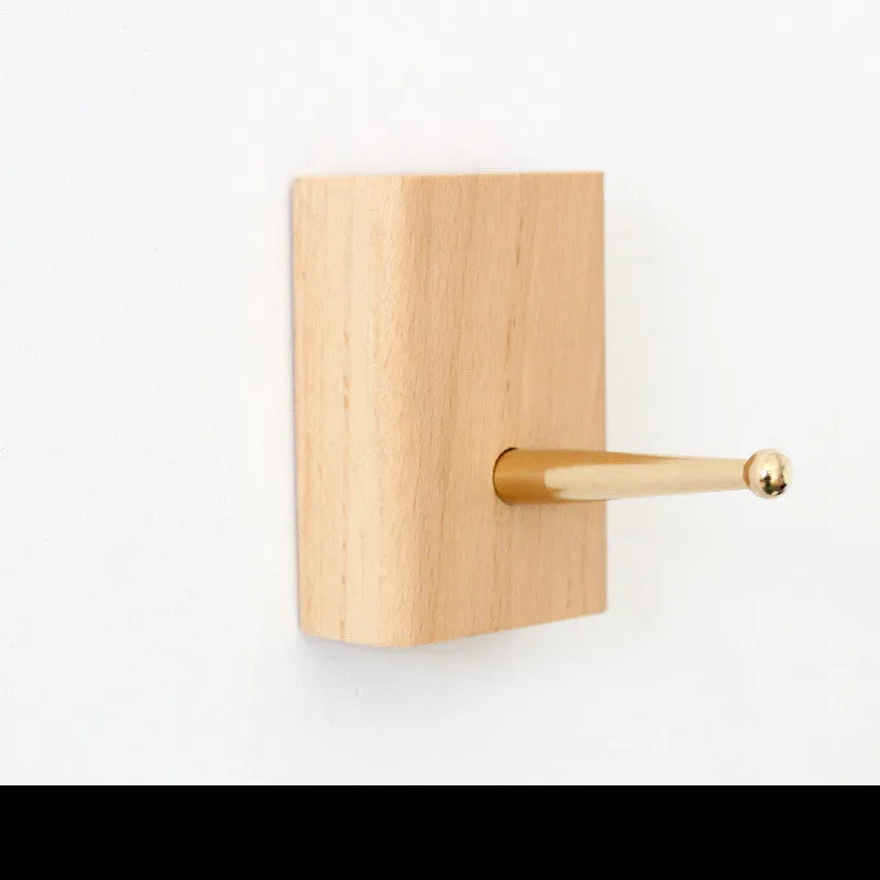 Natural beech wood adhesive wall hook with brass fitting in five minimalist shapes