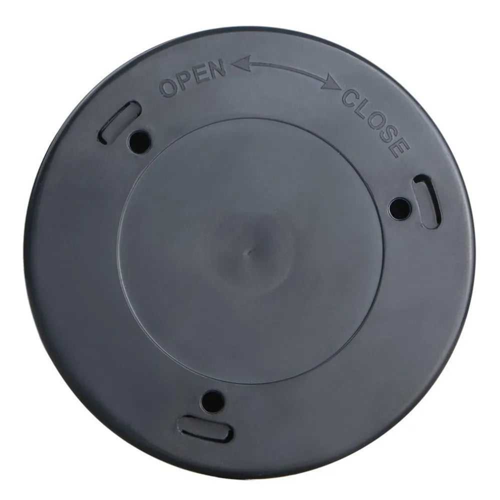 Silver circular motion sensor night light with 80mm diameter on table