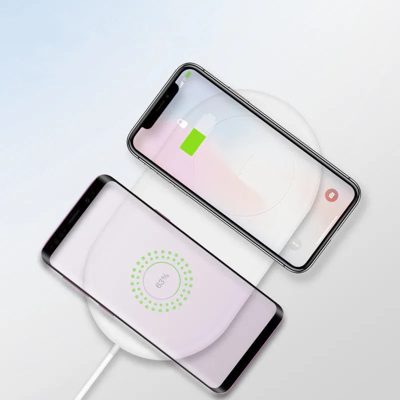 White dual-pad wireless charging station for two mobile phones