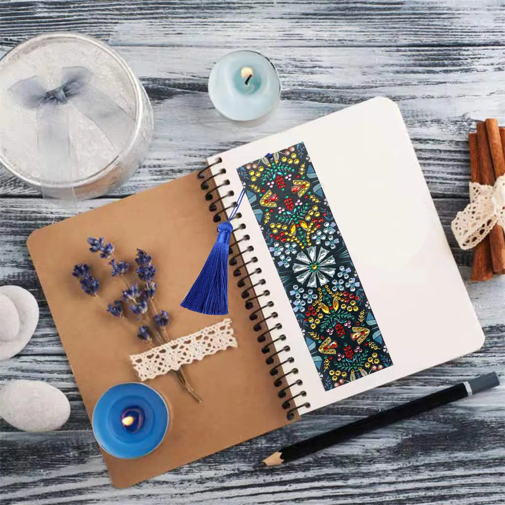 Diamond painting bookmark with leather backing showing intricate mandala flower patterns created with special-shaped diamond embroidery