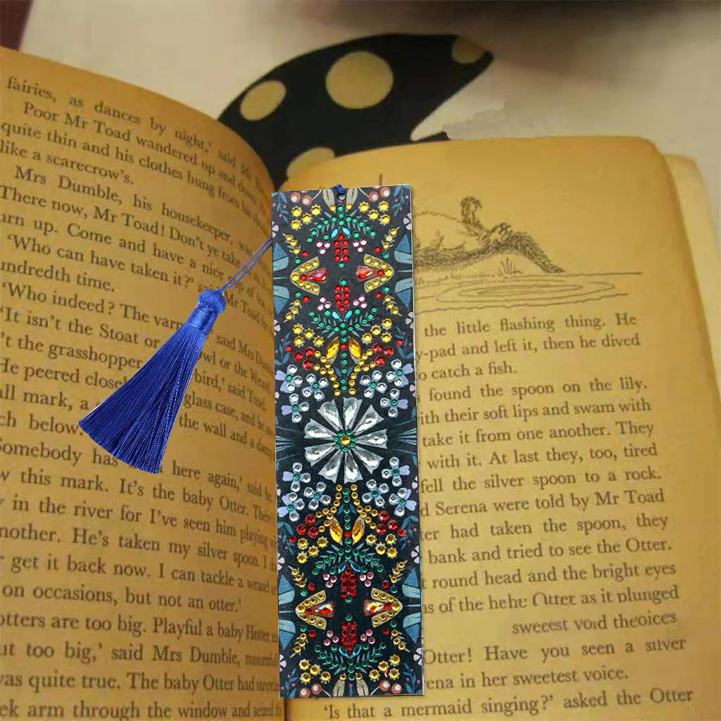 Diamond painting bookmark with leather backing showing intricate mandala flower patterns created with special-shaped diamond embroidery