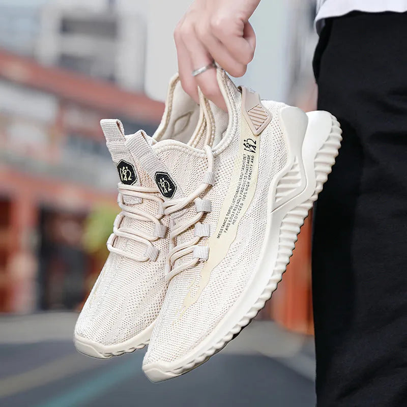 Men's white mesh sports trainers with rubber sole and round toe design