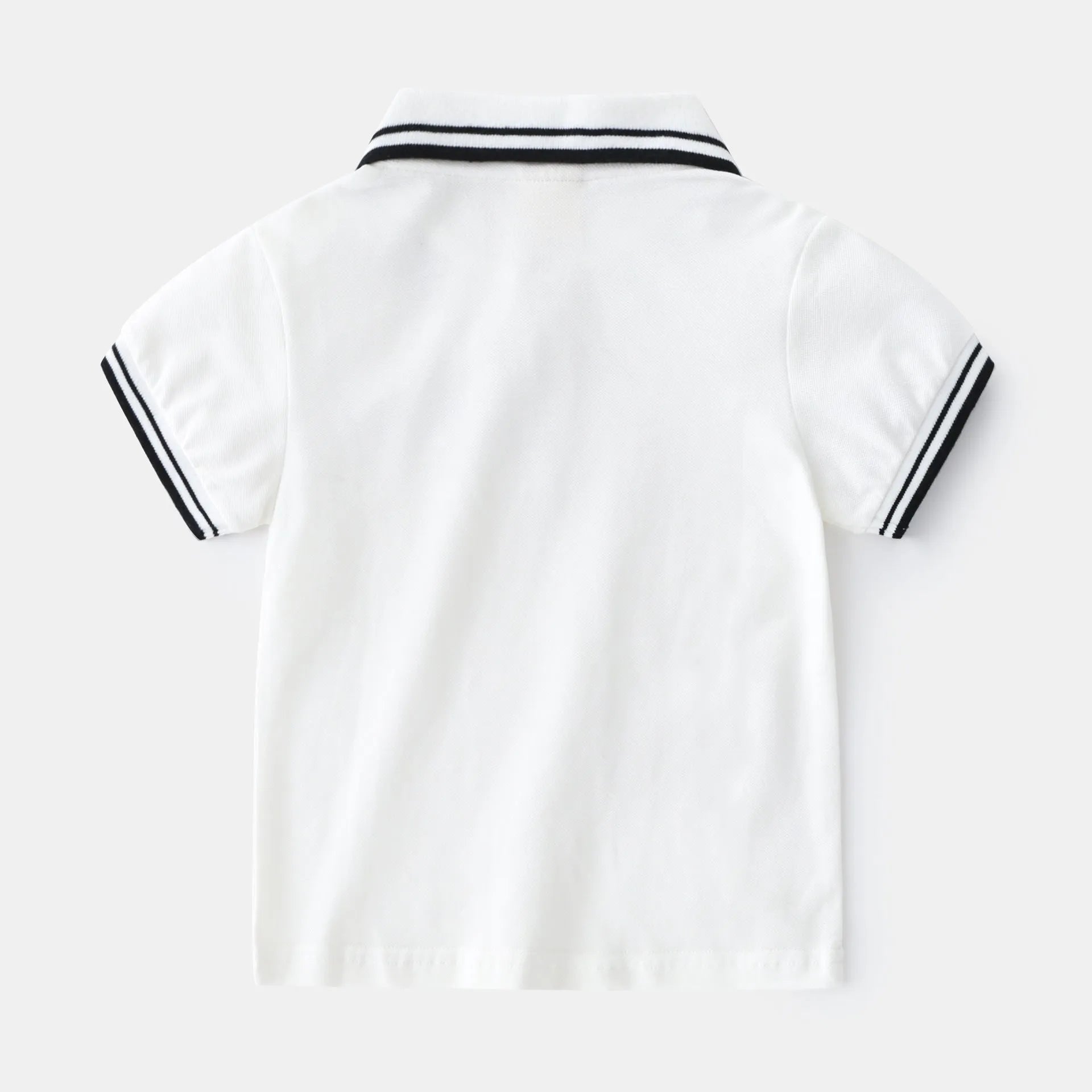 Boys' white and black cotton polo shirt with short sleeves and round neck