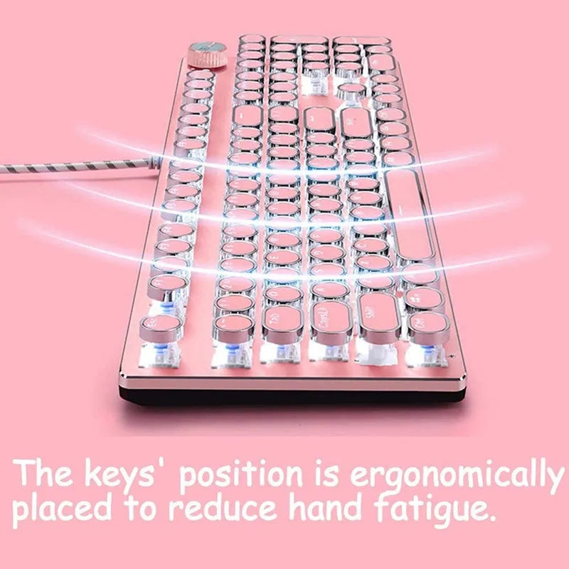 Wired silver mechanical keyboard with pink round keycaps and green switches next to matching mouse.