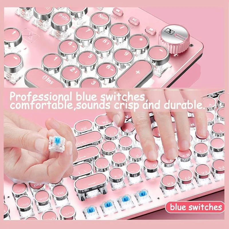 Wired silver mechanical keyboard with pink round keycaps and green switches next to matching mouse.
