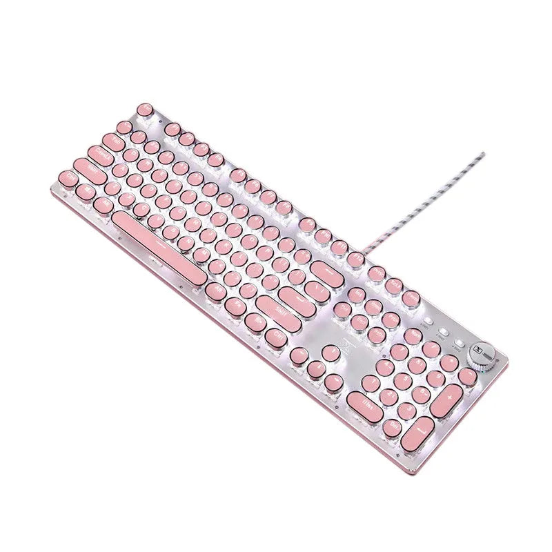 Wired silver mechanical keyboard with pink round keycaps and green switches next to matching mouse.