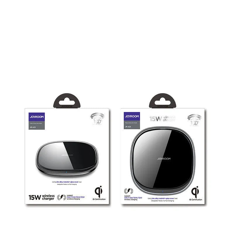 Black and white 15W wireless phone charger with zinc alloy and glass build on a desk.