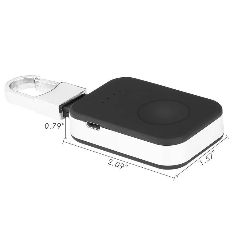 Black keychain-sized wireless power bank for Apple Watch showing front view and size relative to a keyring.
