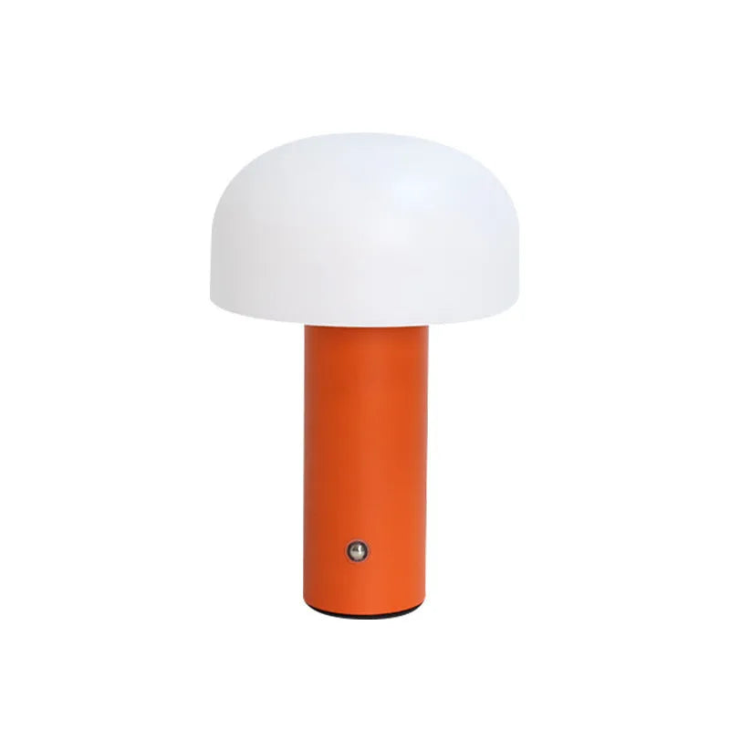 USB-powered plastic table lamp with integrated charging port in black, green, orange, or white.