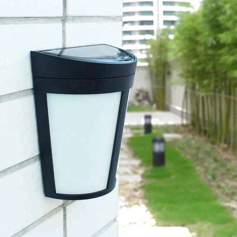 Solar wall lamp with 6 LEDs and IP65 waterproof rating for outdoor garden and courtyard lighting