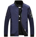 Reversible men's casual bomber flight jacket shown in black, blue, and green colour options with a stripe pattern.
