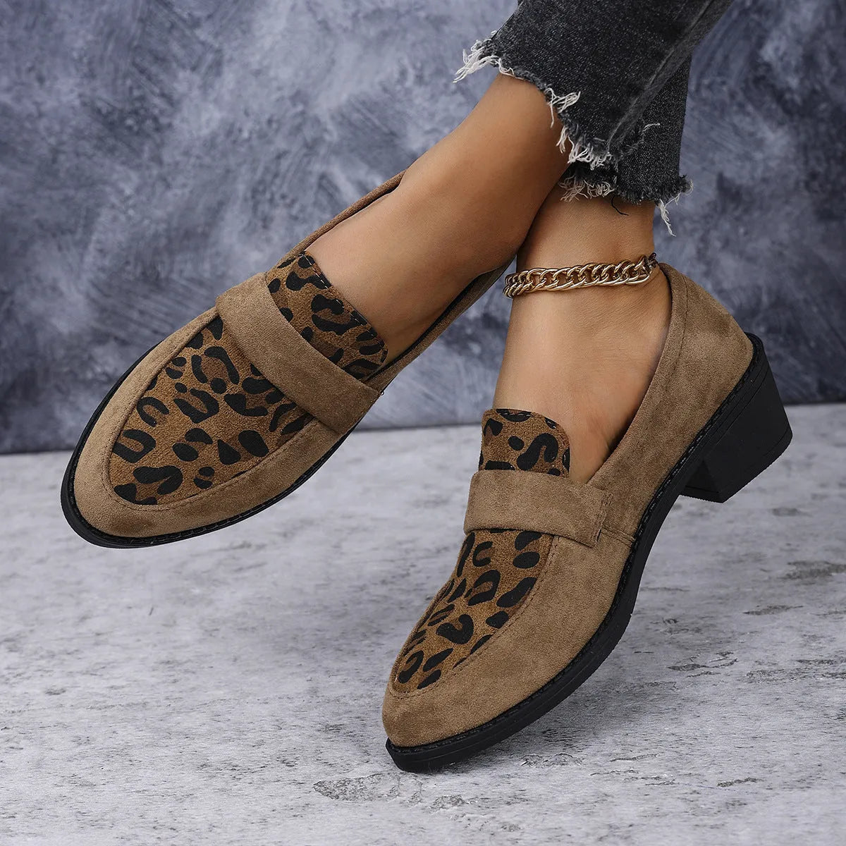 Leopard print suede slip-on shoe with a chunky mid-heel and pointed toe in pink