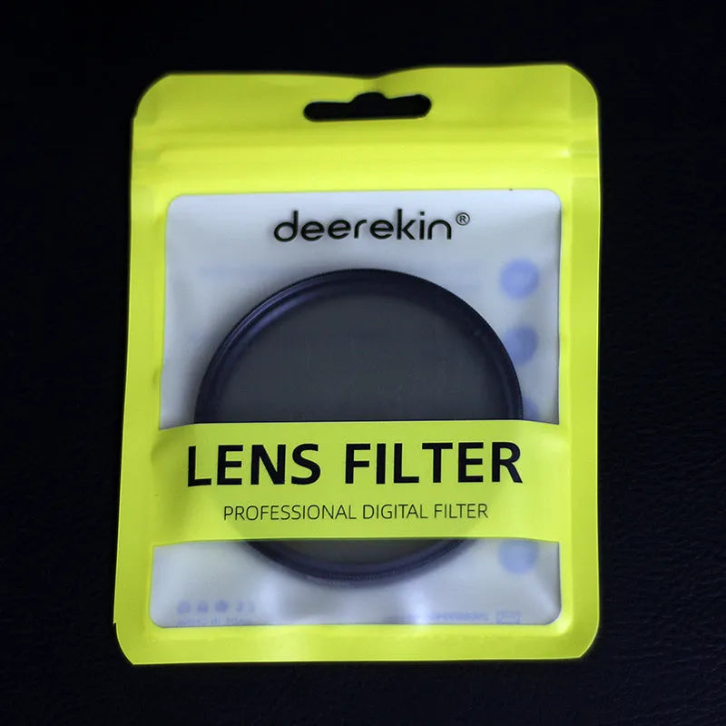 ND8 camera lens filter with aviation aluminium frame shown next to a camera lens