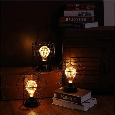 Minimalist iron hollow table lamp with wine bottle design and warm white LED lighting