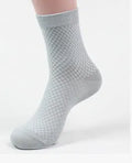 Men's bamboo fibre socks with small square pattern in black, grey, blue, and navy colours