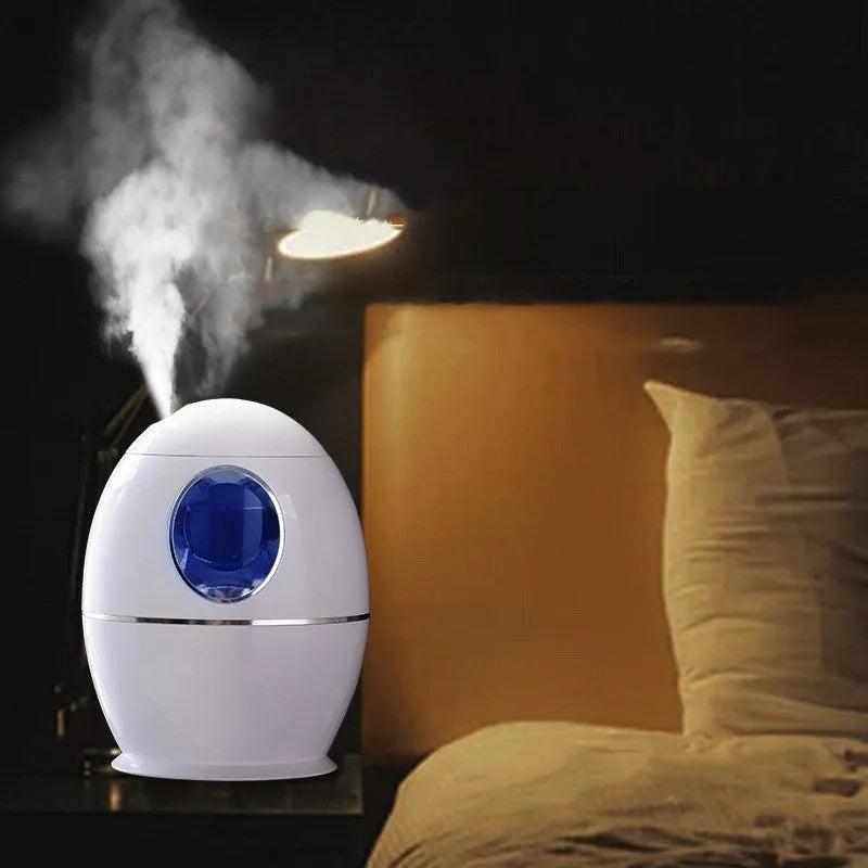 White columnar household air disinfection humidifier with USB cable and mechanical control dials.