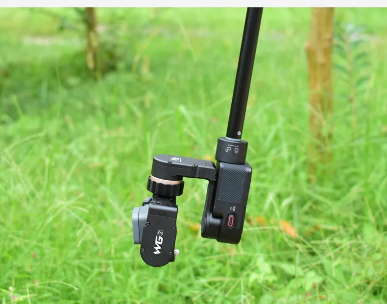 Black retractable selfie stick handheld stabiliser extended for smartphone photography