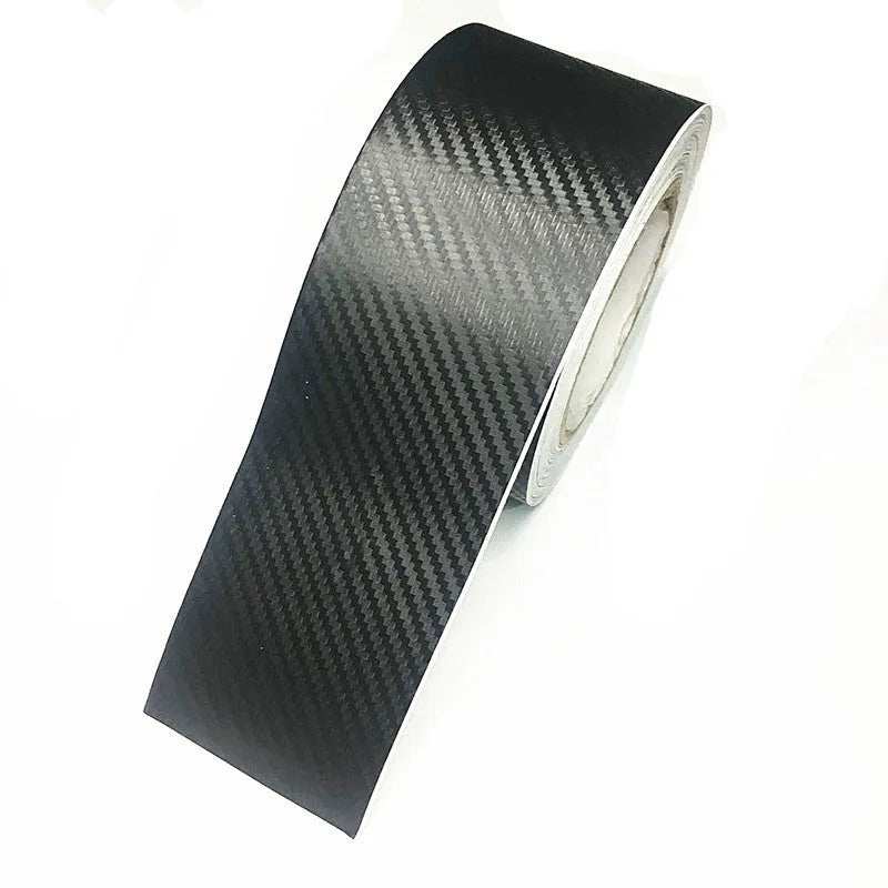 Matte 3D carbon fibre adhesive roll for car door sill protection in various widths.