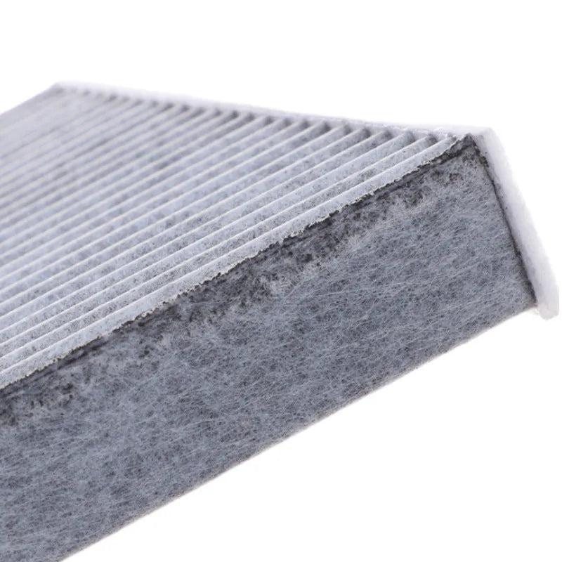 Grey grid-style air conditioning filter for Geely cars, dimensions 215x210x30mm