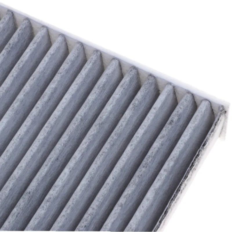 Grey grid-style air conditioning filter for Geely cars, dimensions 215x210x30mm