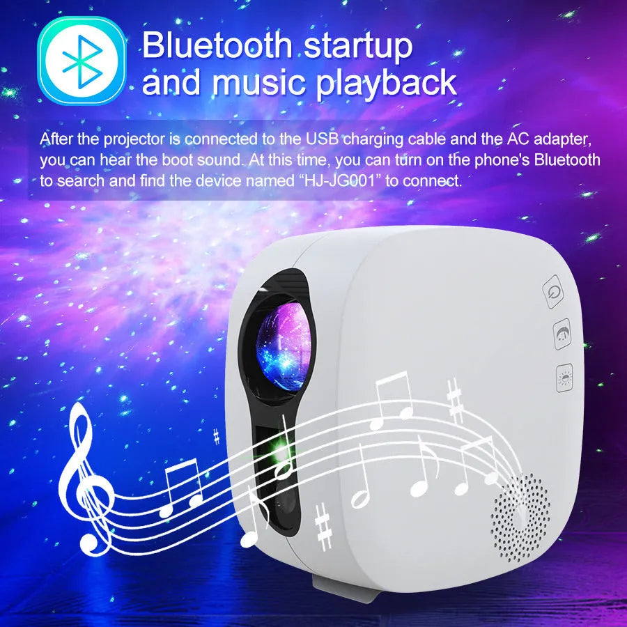 Black and white laser star projector with Bluetooth music player showing nebula projection