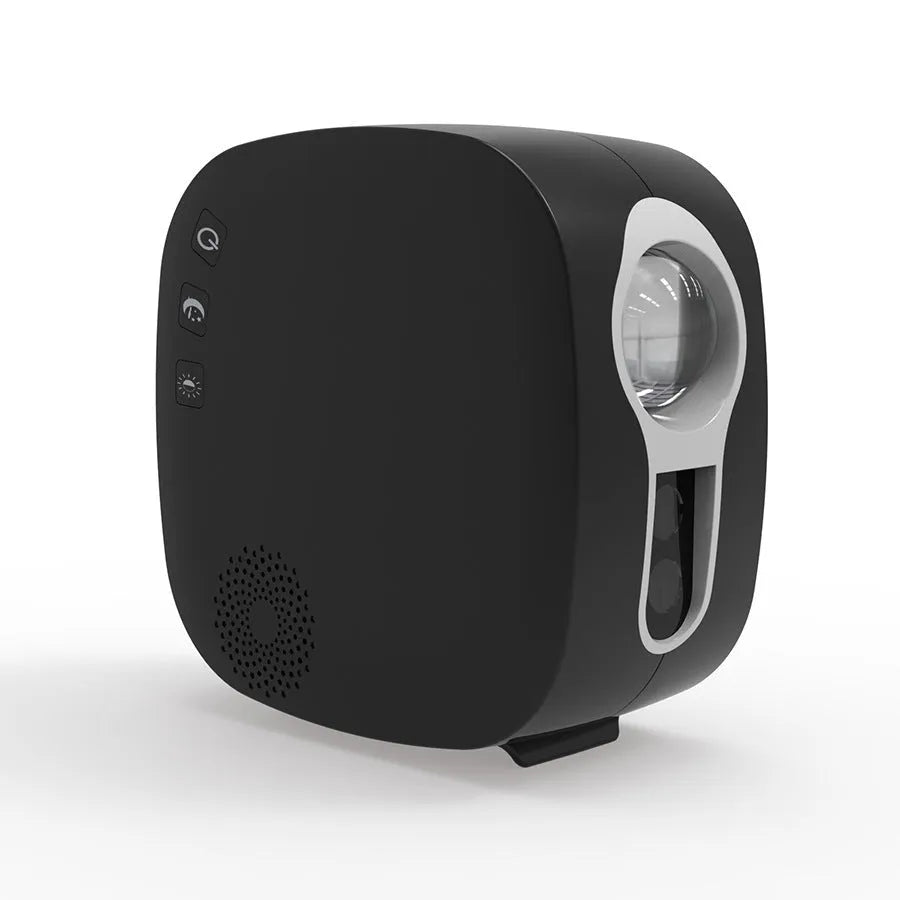 Black and white laser star projector with Bluetooth music player showing nebula projection