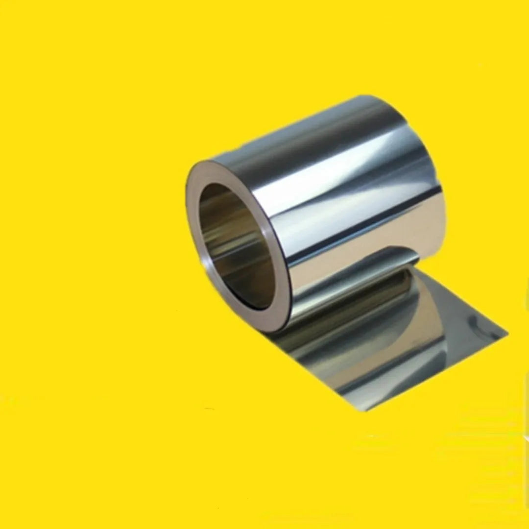 Close-up of thin 304 stainless steel sheet with leather backing on a car interior trim piece.