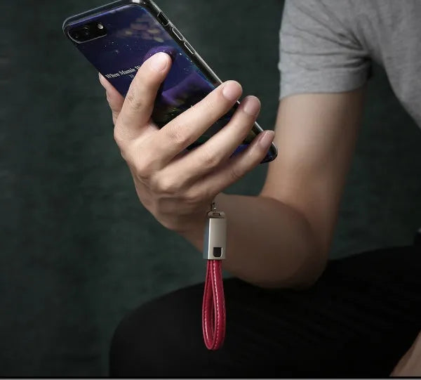 Short 20cm leather braided iPhone charging cable with zinc alloy lightning connector, shown in red colour.