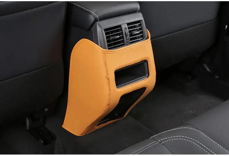 Three-piece leather anti-kick pad set for Mitsubishi Outlander SUV interior protection