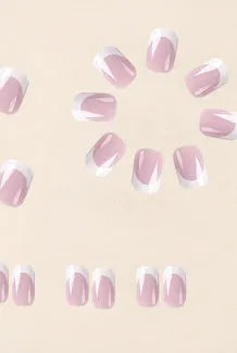 24 white square fake nails with a black and white plaid pattern design laid out on a surface.