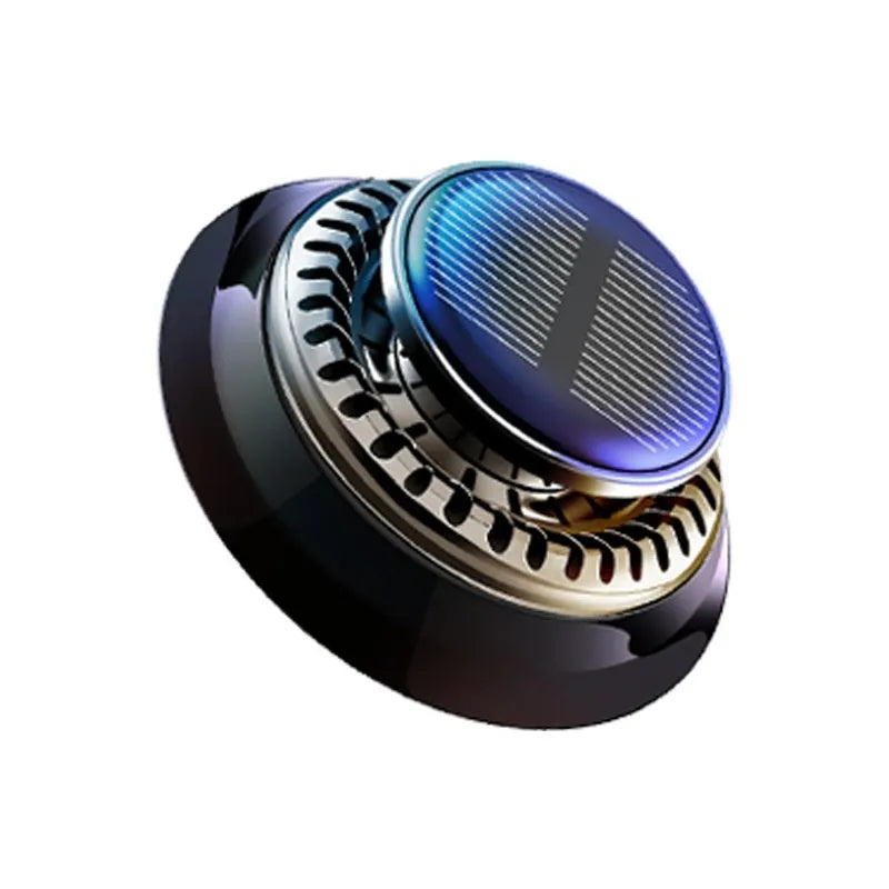 Solar-powered kinetic car air freshener with rotating double rings on a car dashboard.