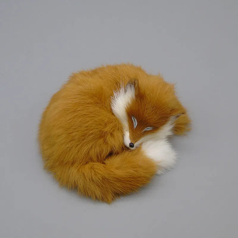 Artificial fox fur handicraft decoration in white, red, or yellow colours measuring 15cm with car accessory