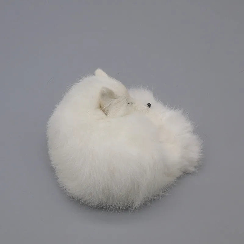 Artificial fox fur handicraft decoration in white, red, or yellow colours measuring 15cm with car accessory
