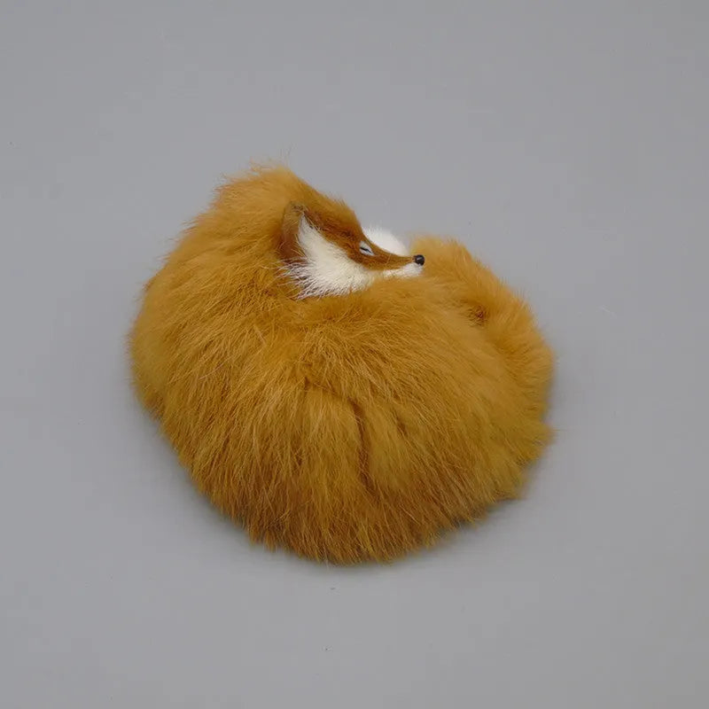 Artificial fox fur handicraft decoration in white, red, or yellow colours measuring 15cm with car accessory