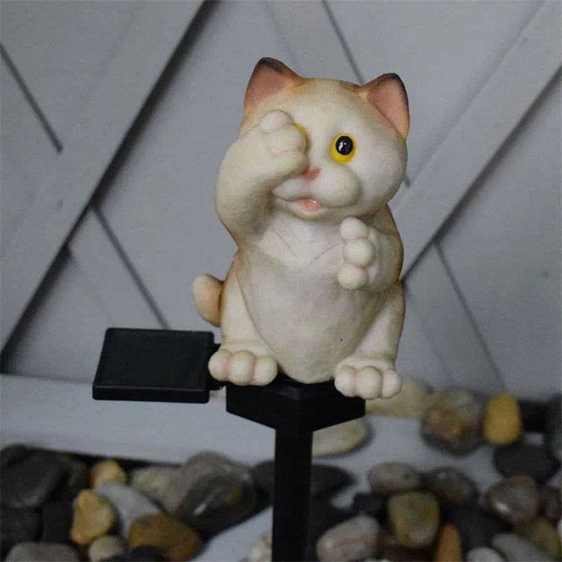 Solar cat lawn light with resin construction for garden pathways