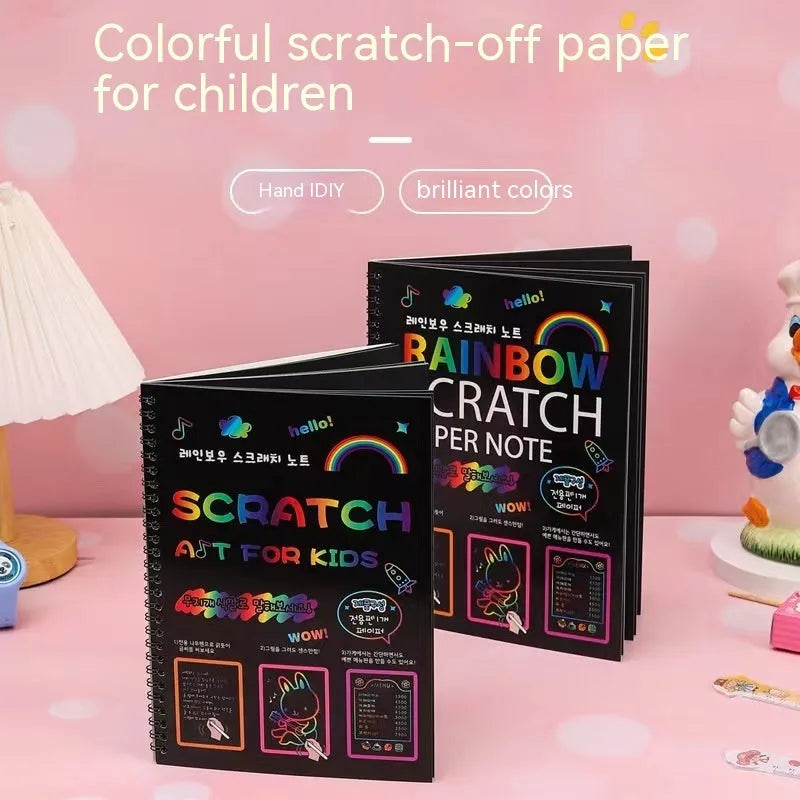 Children's large scratch art paper with scraper tool revealing colourful puzzle design