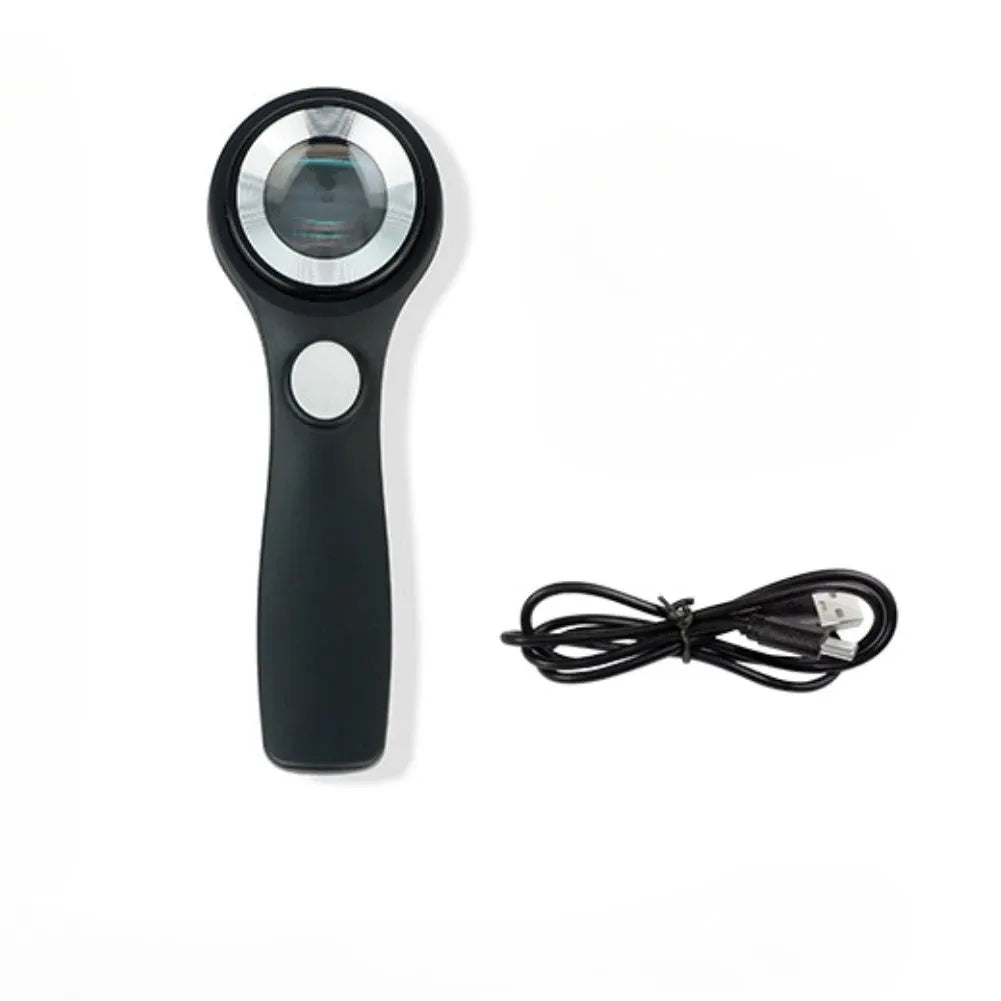 Black handheld magnifying glass with LED light for jewellery and coin appraisal.