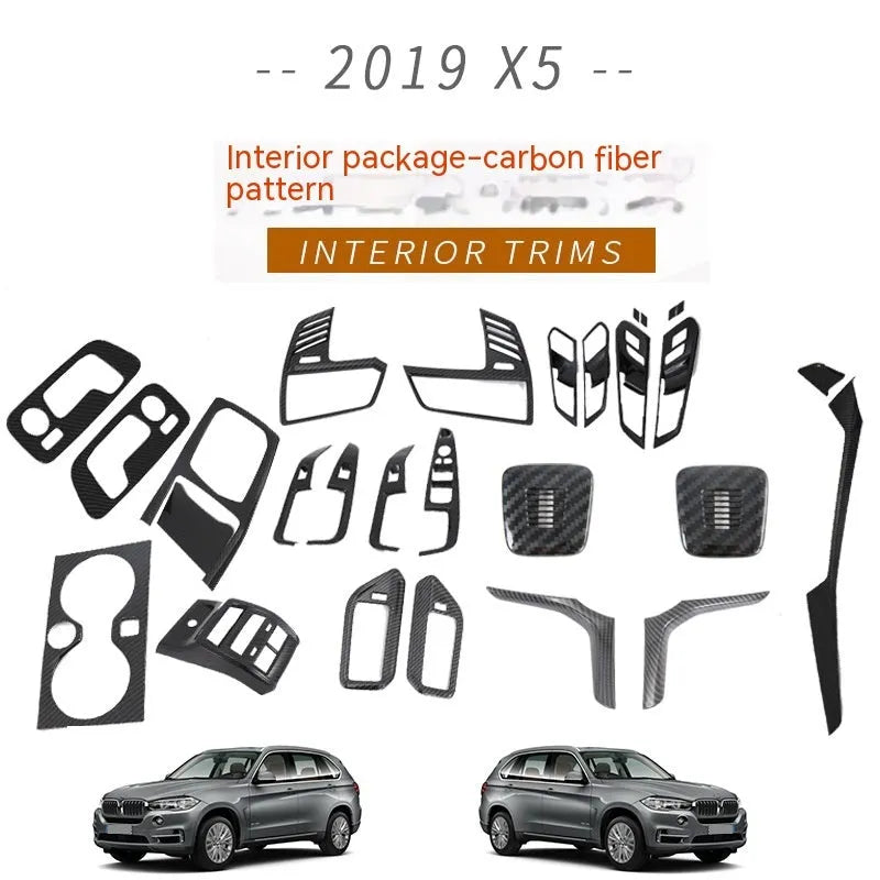 Black ABS interior trim centre console panel for 2019 BMW X5 with cup holder space.