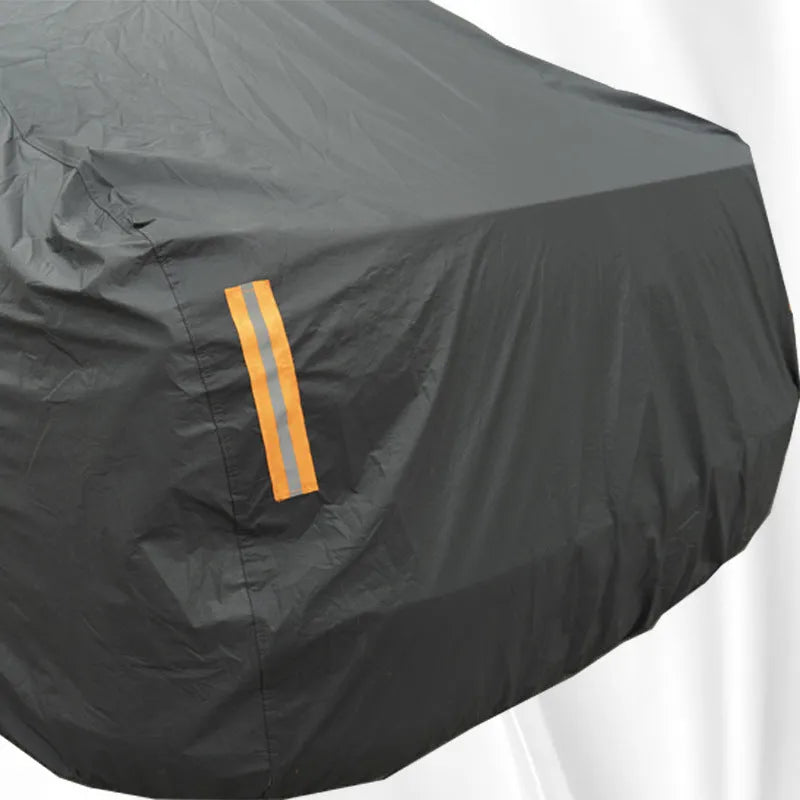 Grey thickened PVC car cover for Volkswagen vehicles, shown in a folded state.