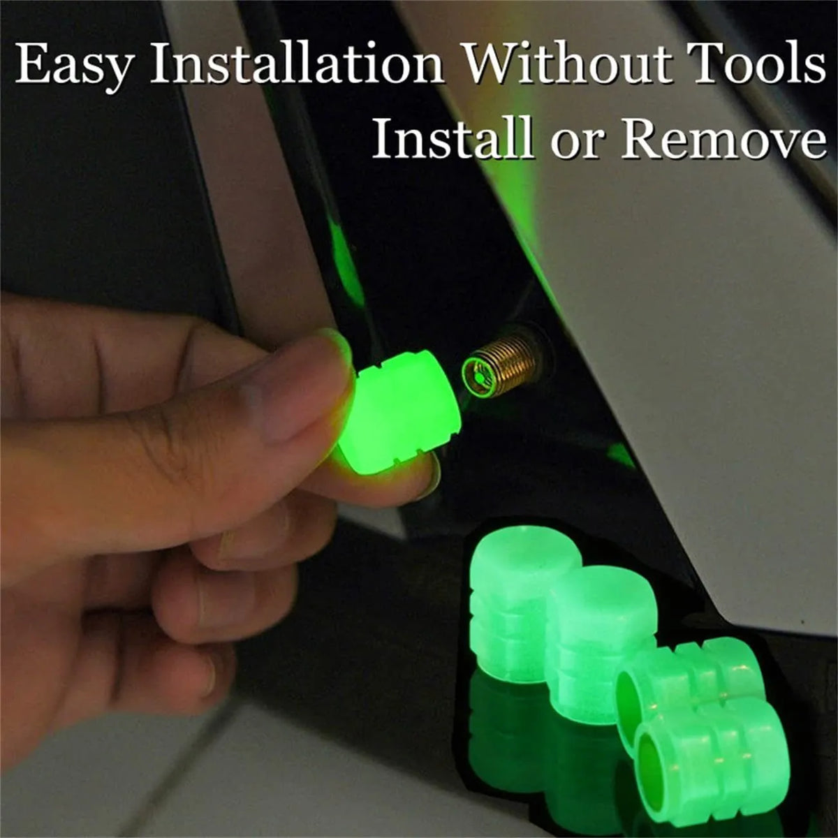 Set of luminous rubber tyre valve caps in assorted colours on a car wheel valve stem.