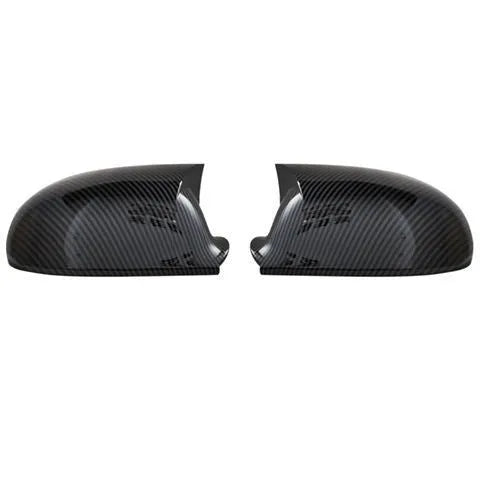 Pair of plastic mirror housings for Volkswagen Old Sagitar in black and carbon fibre finishes.