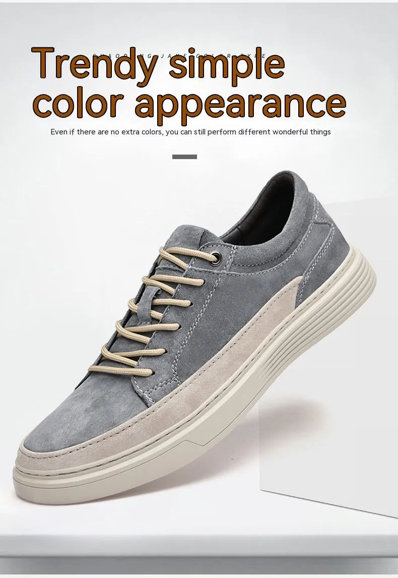 Men's grey casual leather skate shoes with round toe and lace-up front on a rubber sole.