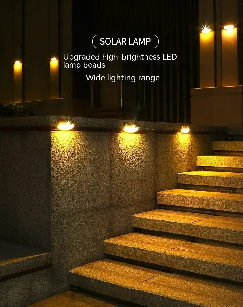 Solar outdoor wall lamp with smiling face design for garden courtyard lighting