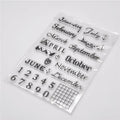 Close-up of a transparent silicone vintage calendar and digital table icon stamp on a white background.
