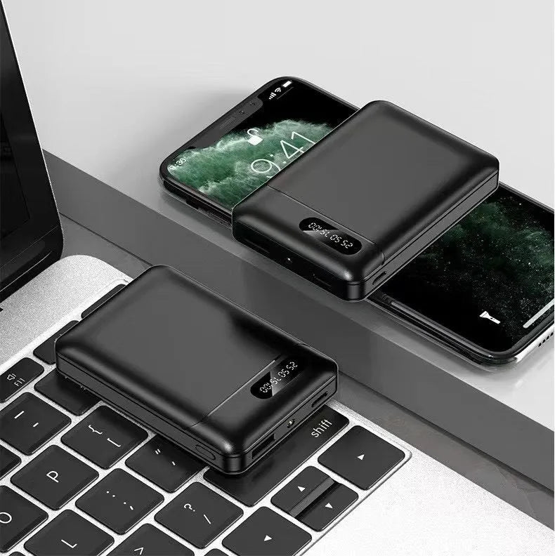 Black and white portable power bank with dual USB ports showing capacity options from 4000mAh to 10000mAh