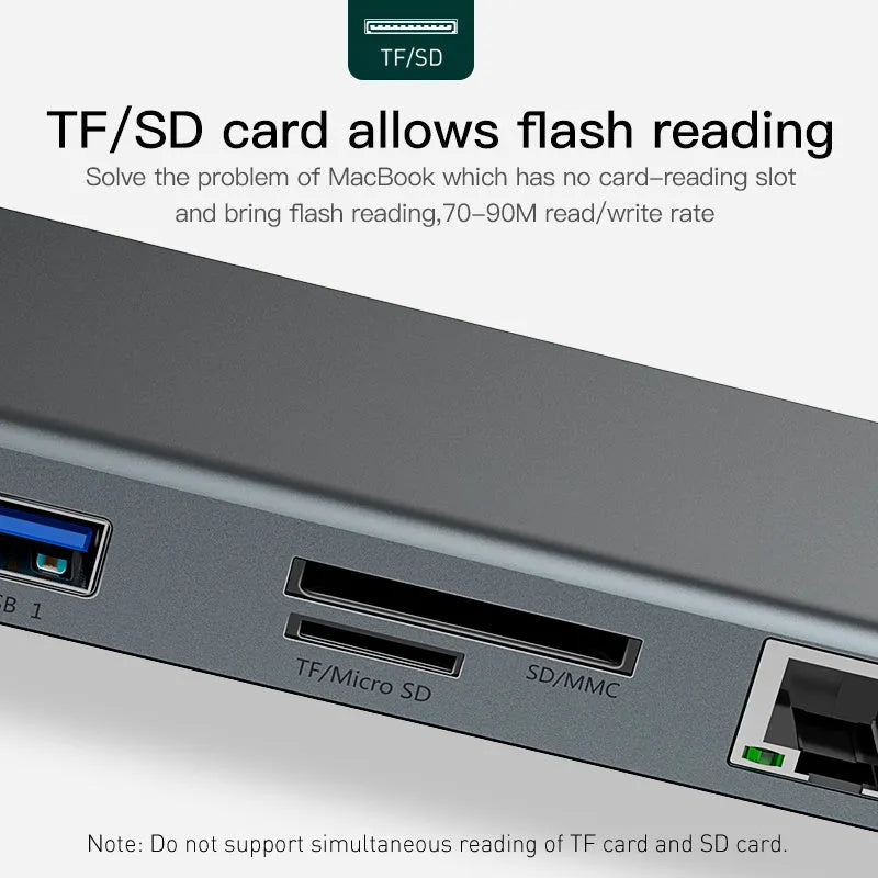 Grey aluminium ten-port USB hub docking station with cooling bracket on a desk.