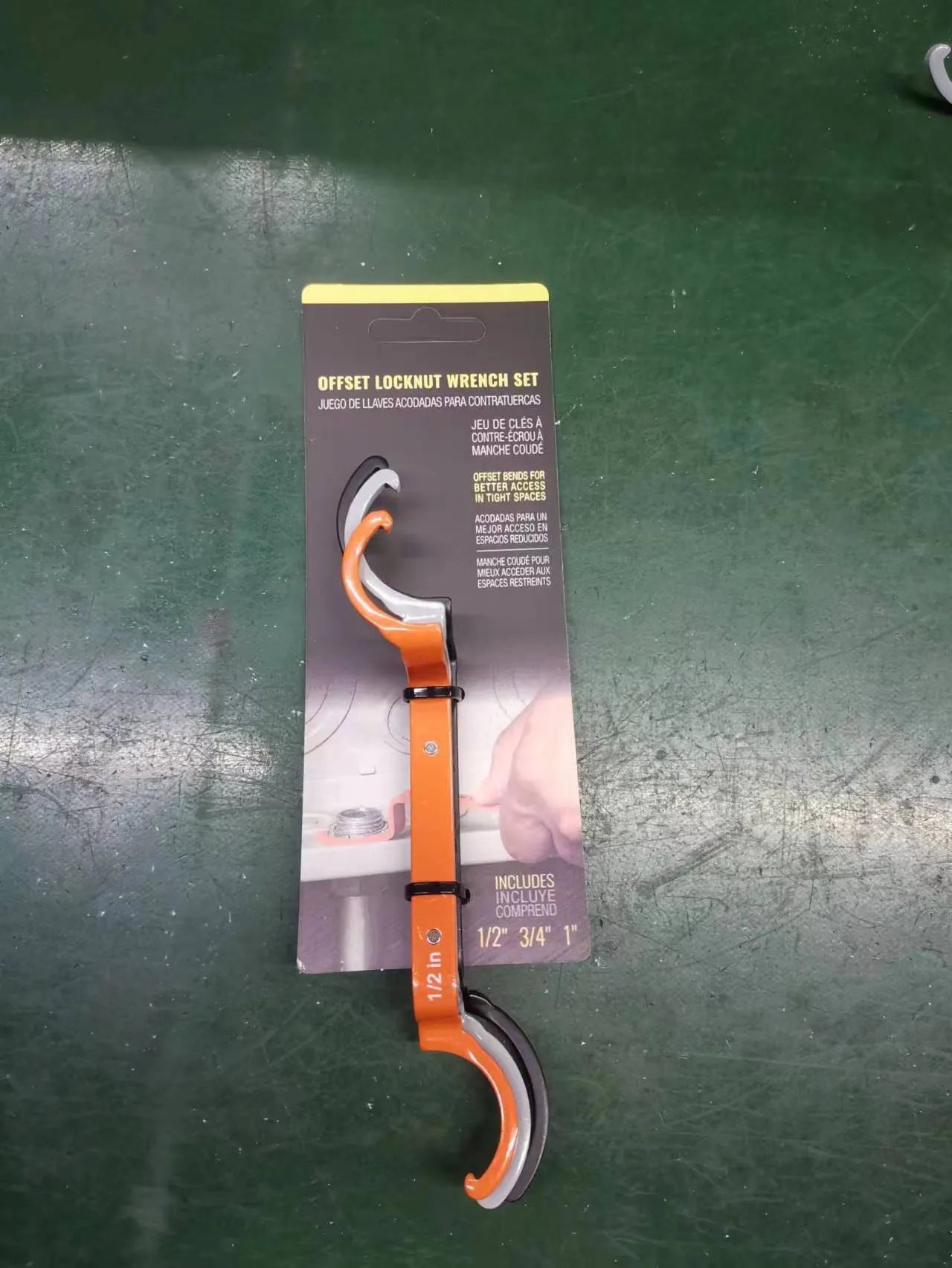 Three-piece crescent magnetic suction wrench kit in orange, gray, and black with locking mechanism.