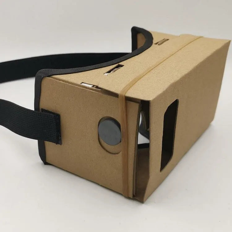 Pink and white foldable cardboard VR glasses headset for smartphones, showing 3D lenses and rubber head strap.