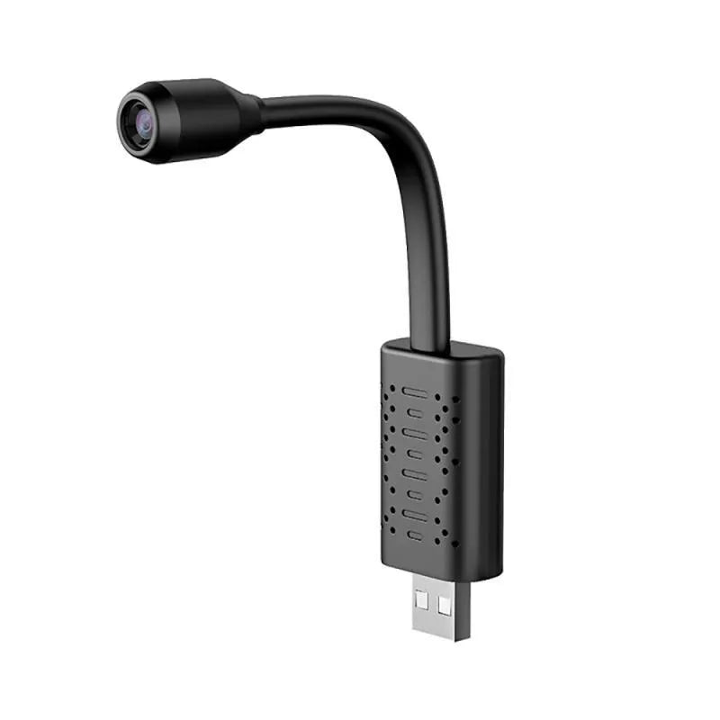 Black V380 wireless USB HD security camera showing its compact size and USB connection port.
